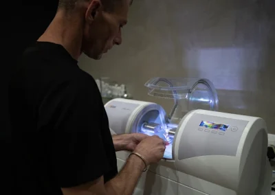 Neil de Villiers preparing a custom dental restoration.